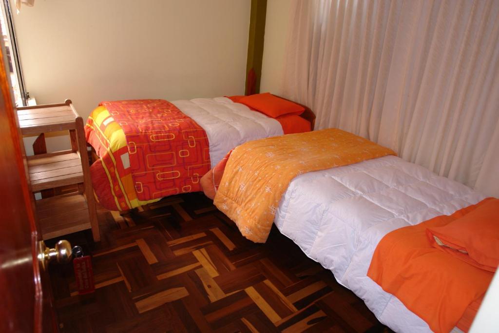ホテル ホステル カサ デル インカ クスコ 部屋 写真